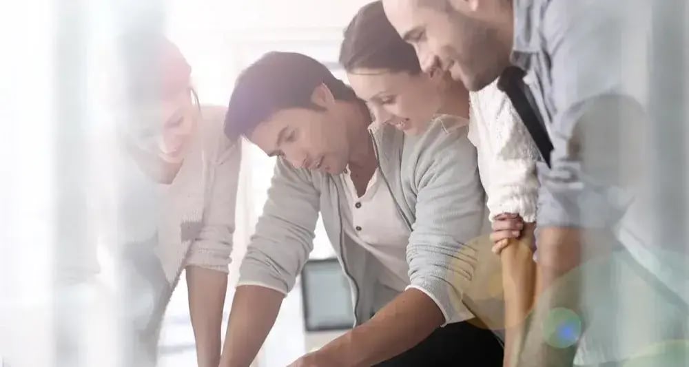 Group of business people in office working on project